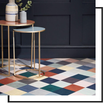 colorful floor, small circular tables and vases